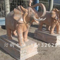 象鼻向上大象石雕，晚霞紅大象雕塑